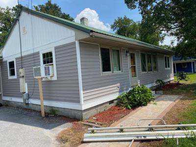 house with gray vinyl siding